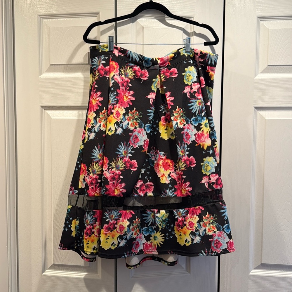 Black and Floral Plus Size Skirt with sheer mesh detail. Torrid Size 2